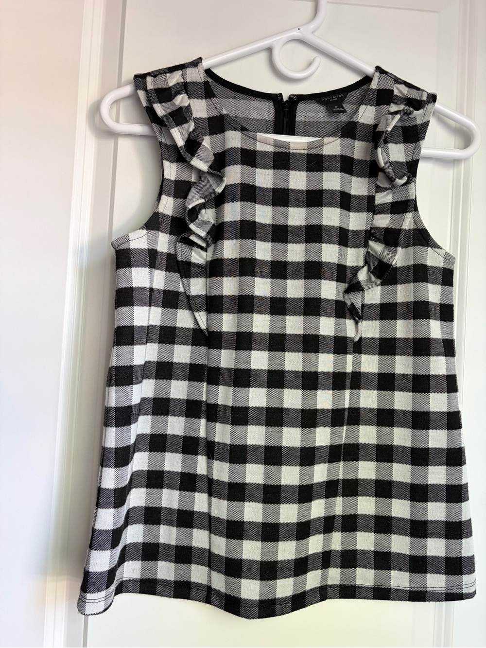 Ann Taylor sleeveless buffalo checkered black and white top with ruffle